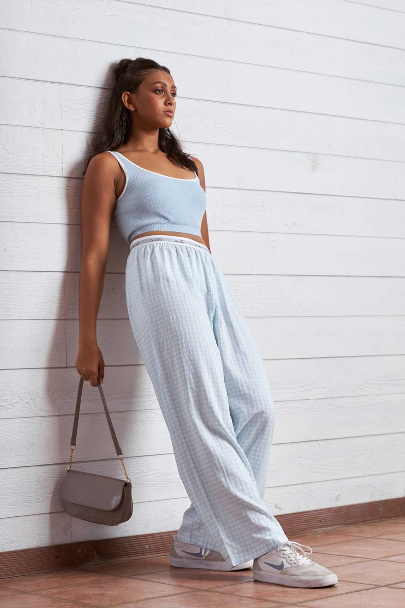 Teen Wearing Blue Ribbed Thin Strap Crop Top in Colombo, Sri Lanka