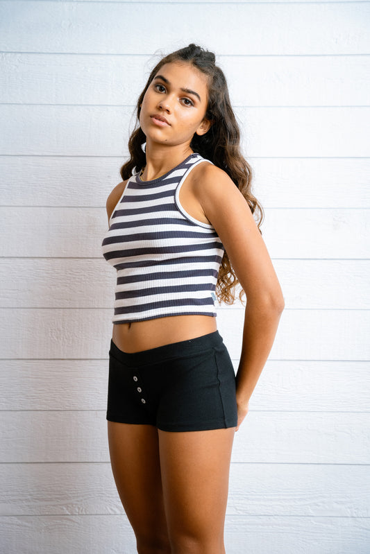 Our comfiest mini shorts are made to lounge. It has a non-functional button detail in the middle for some extra cuteness. Made with 100% cotton rib. It’s a fit mini boxer short that has a insert elasticated waist band.